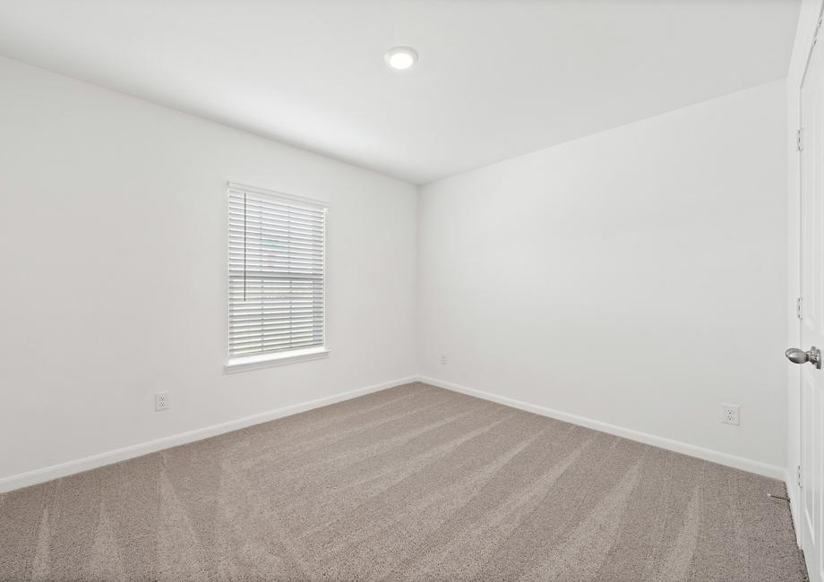 The secondary bedroom has its own closet for extra storage