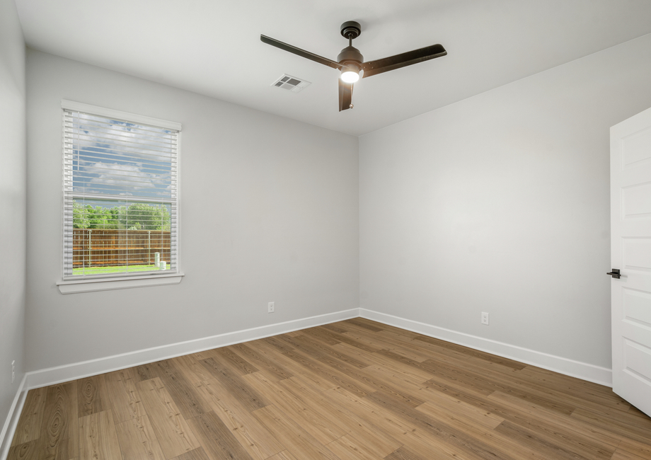 The secondary bedrooms are a great space for a child's bedroom or a guest room.