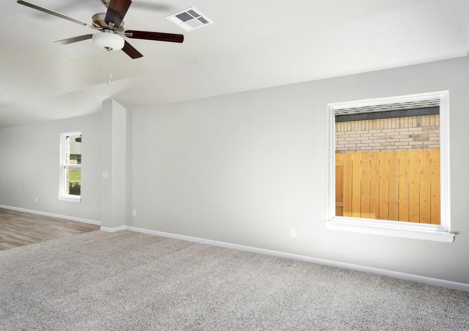 The dining room sits in betweent the kitchen and family room.