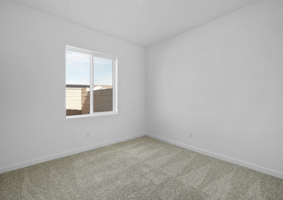 The secondary bedroom has carpet.