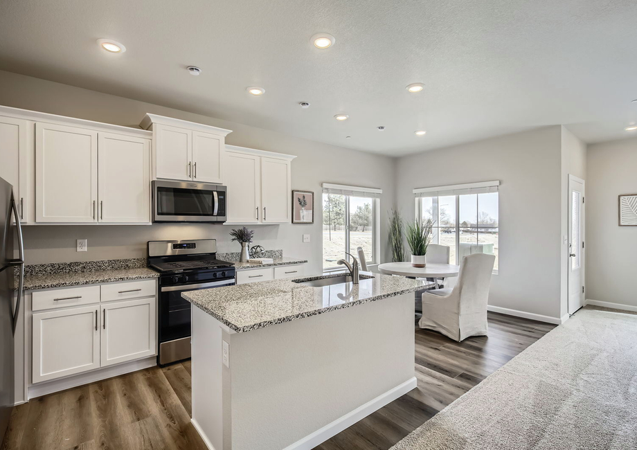 The kitchen has stainless steel appliances and is chef ready.