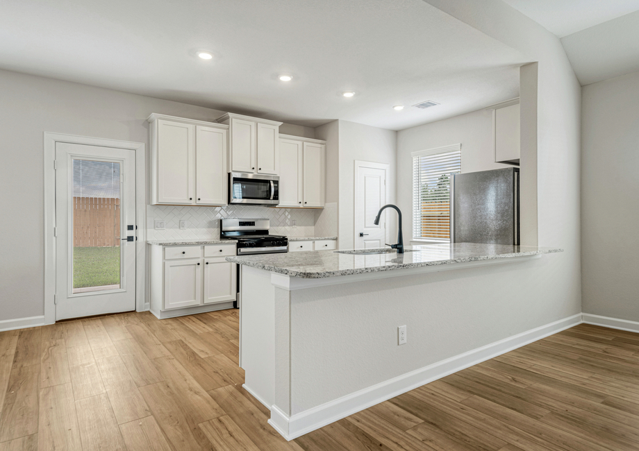 A large breakfast bar in the kitchen