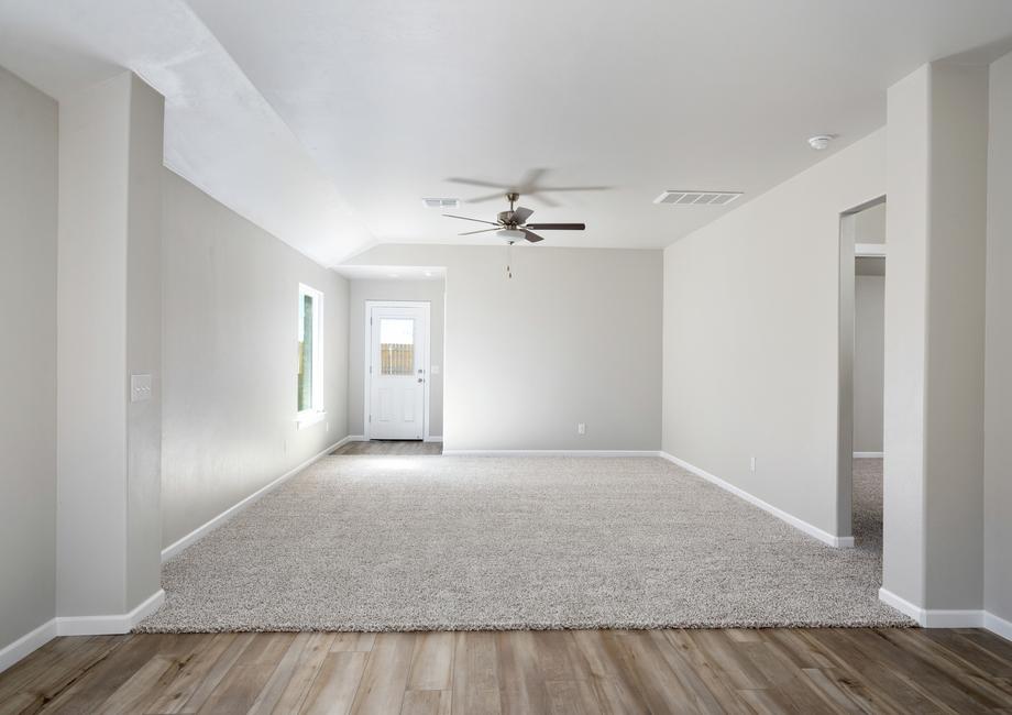 The large family room has plenty of space for furniture.