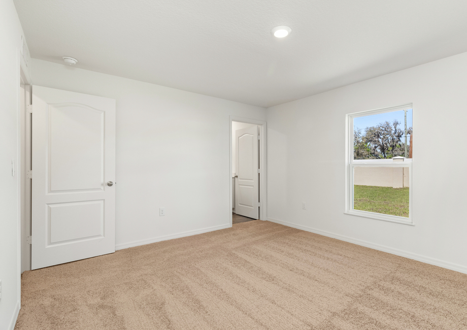 Master bedroom with an en-suite bathroom