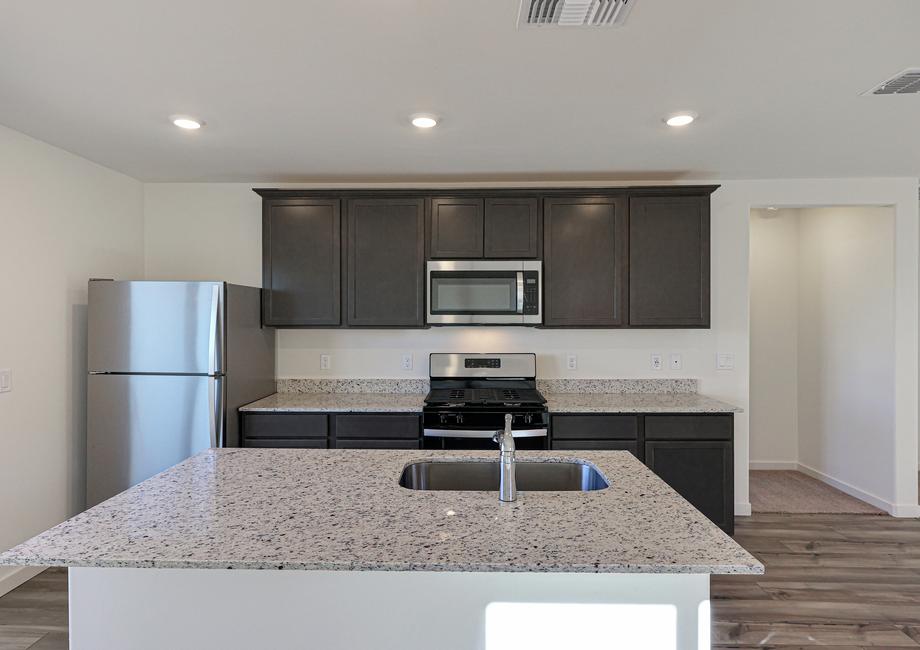 The spacious kitchen is perfect for preparing meals the whole family will love.