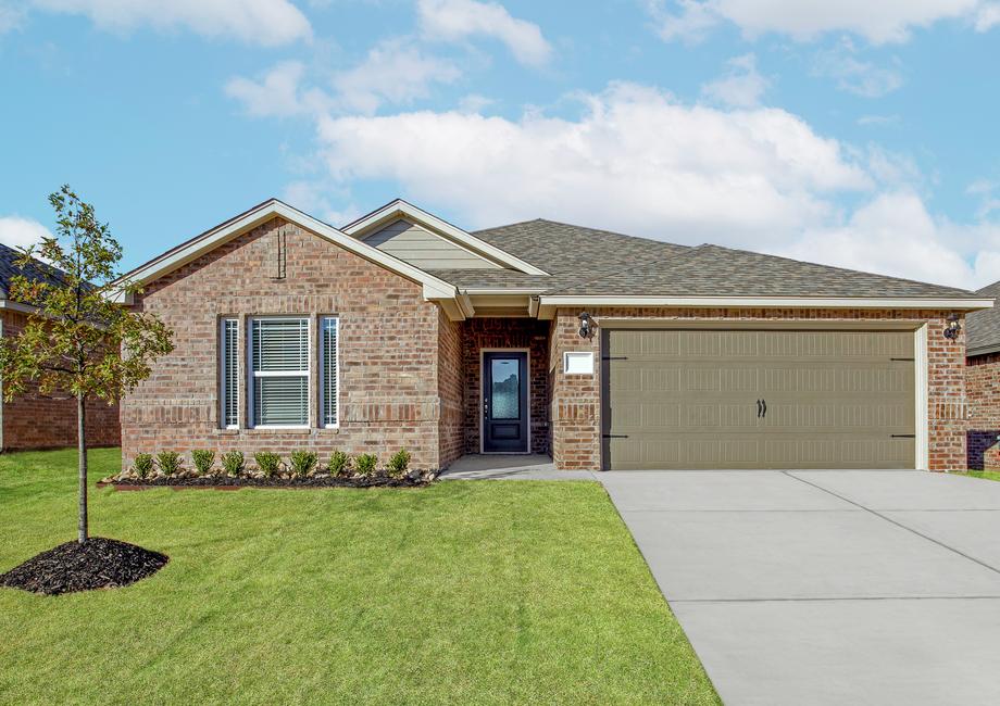 The Keystone is a beautiful floor plan with a brick exterior.