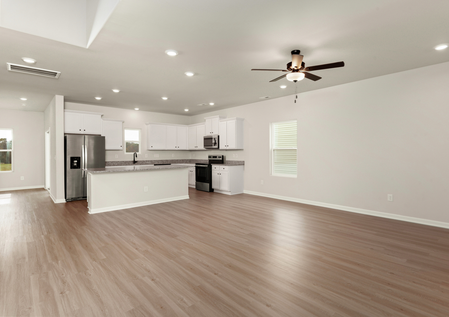 The kitchen opens to the family room