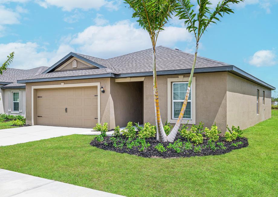 Angled exterior view of the Amelia floor plan with a palm tree in front