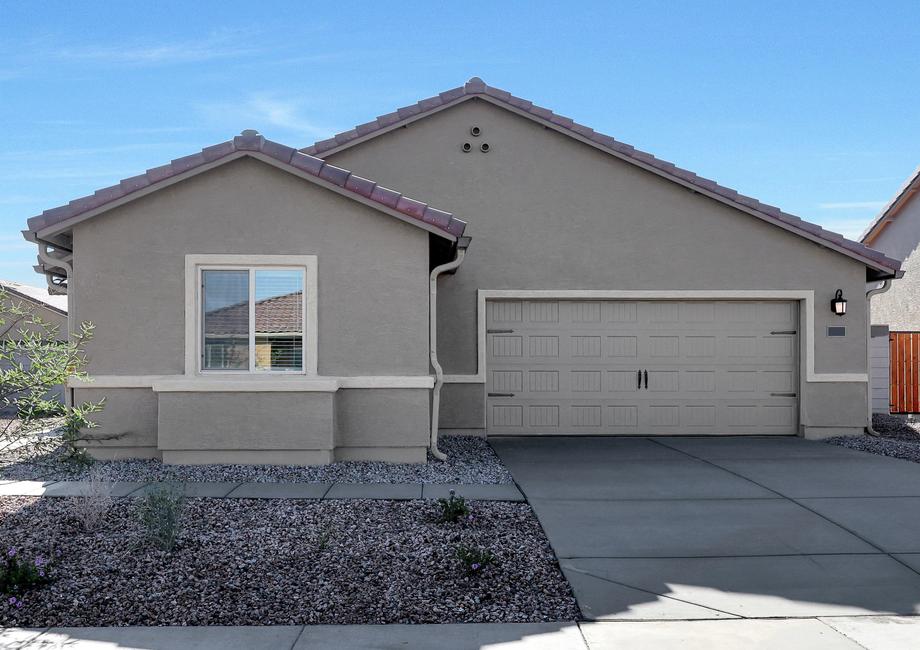 This home has a 2-car garage and gorgeous stucco exterior.