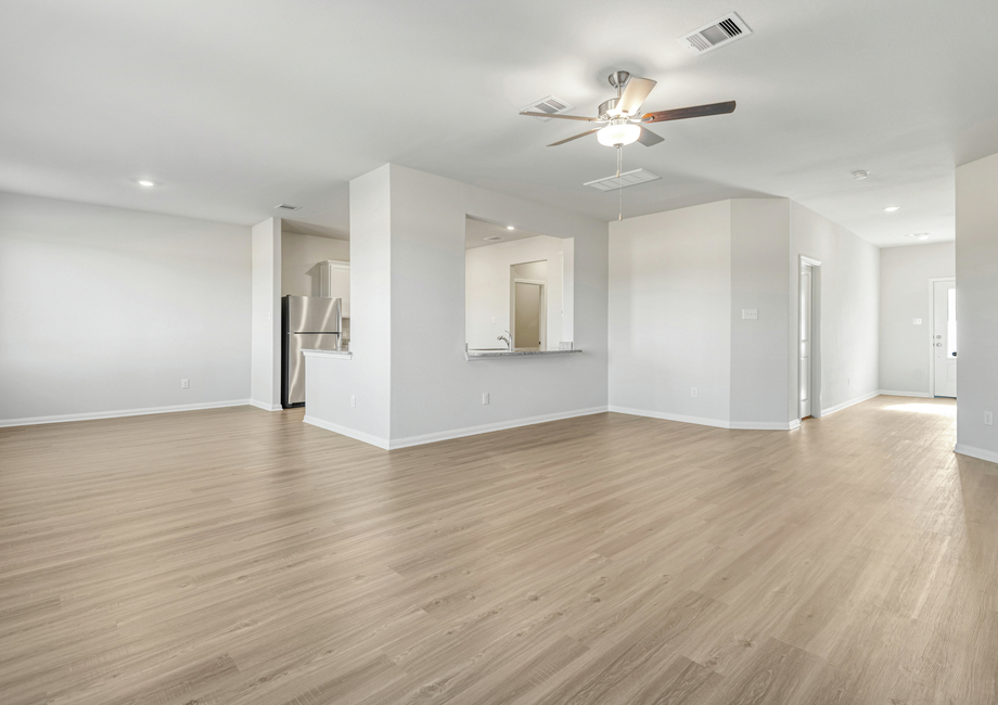 A large family room and adjoining dining room