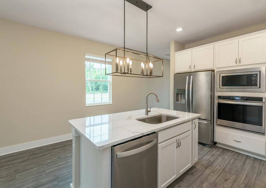 The spacious kitchen is perfect for preparing your family's favorite meals and treats.