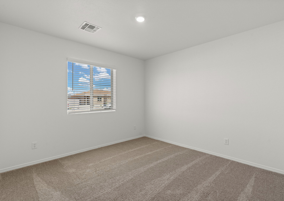 The secondary bedroom has its own walk-in closet.