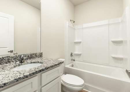 This bathroom has a large soaking tub.