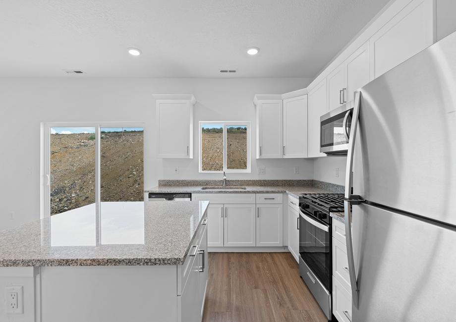 Equipped with stainless steel appliances, this kitchen is ready for chef's of all skill levels