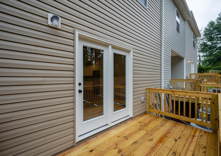 Deck off the back of the house. 