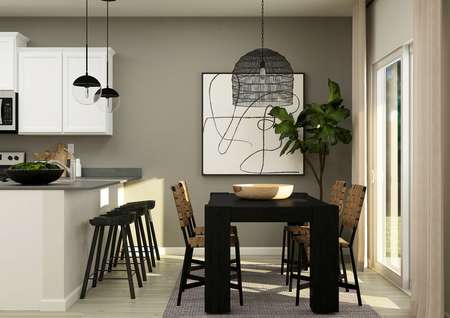 Rendering of a
  dining room furnished with a dark table surrounded by four chairs. The
  kitchen can be seen nxt to the table. 