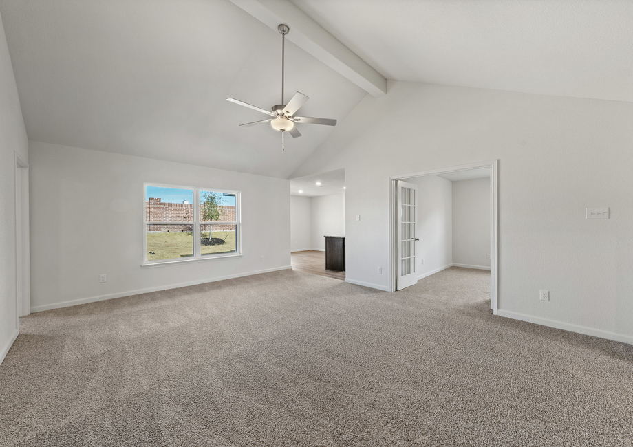 The family room of the Sabine sits right off of the kitchen.