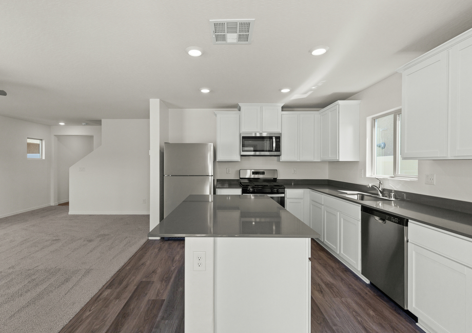 The kitchen of the Oak has sprawling granite countertops.