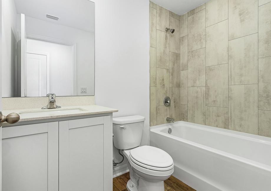 The secondary bathroom gives your guests all the space they need to get ready