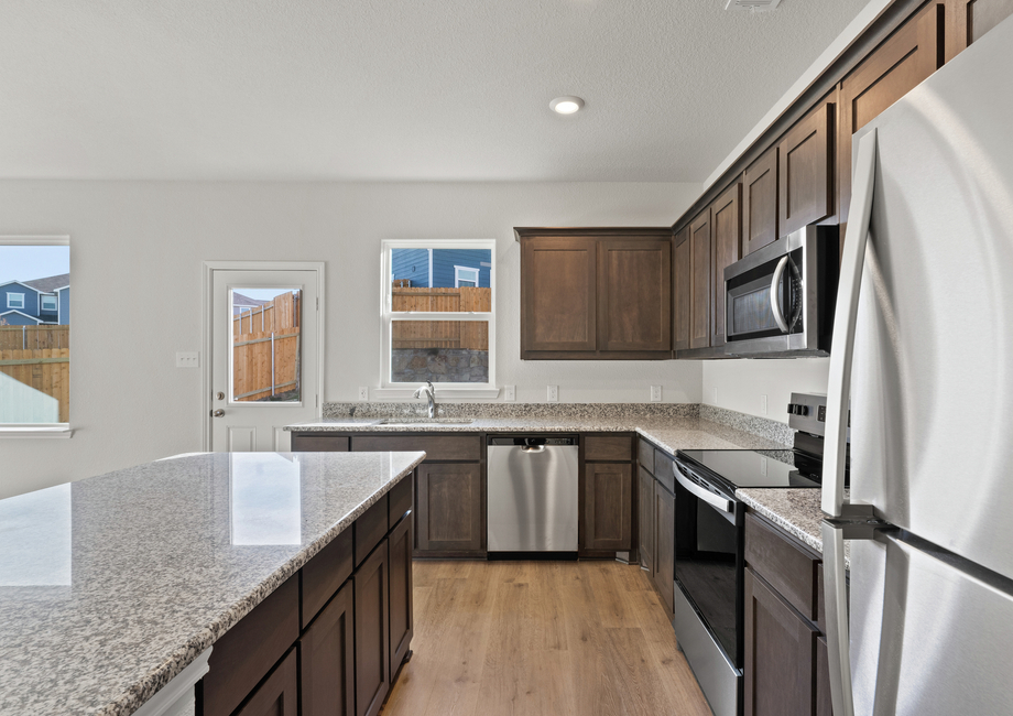 The kitchen has energy-efficient appliances.