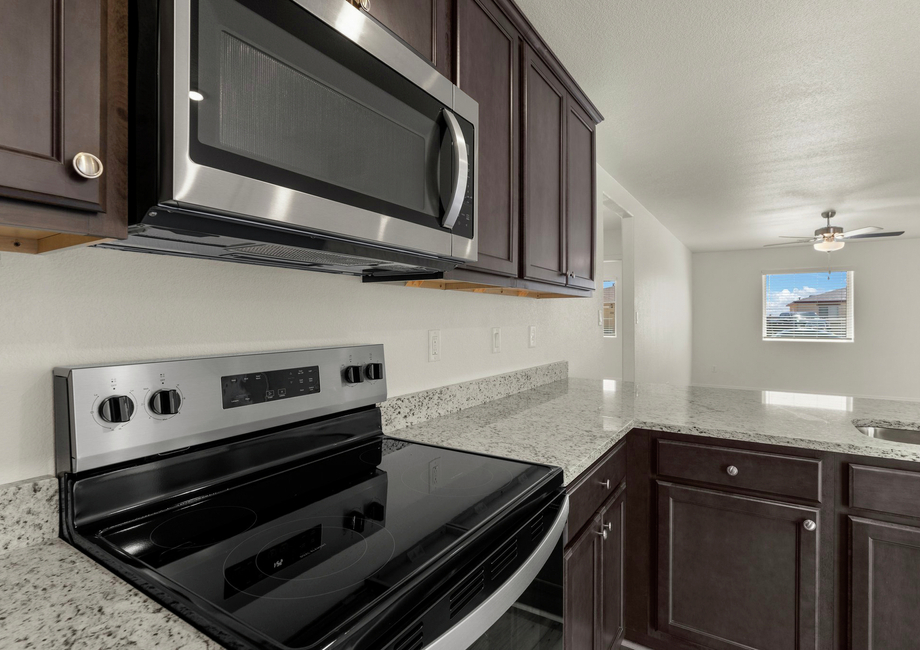 This kitchen comes with brand new stainless-steel appliances.