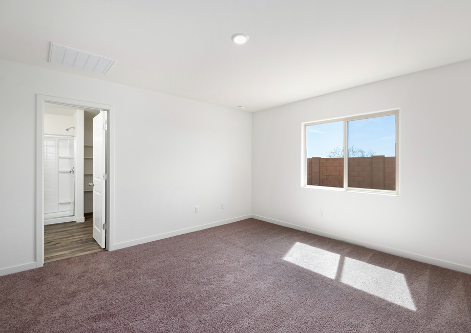 The master bathroom seamlessly connects to your own private en-suite bathroom.