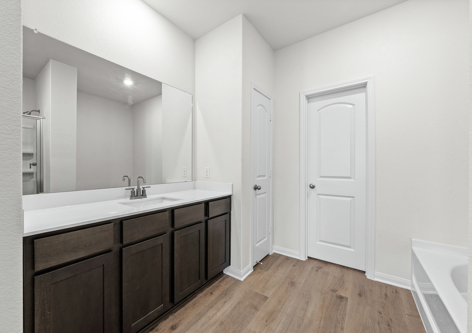 The master bathroom of the Cypress has a large vanity space.