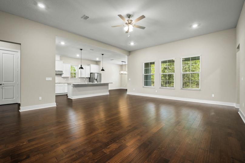 Open floor plan with wood flooring.