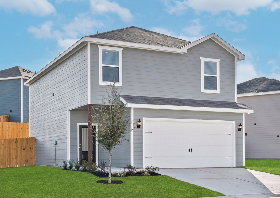 The Jaguar is a beautiful two-story home with siding detail.