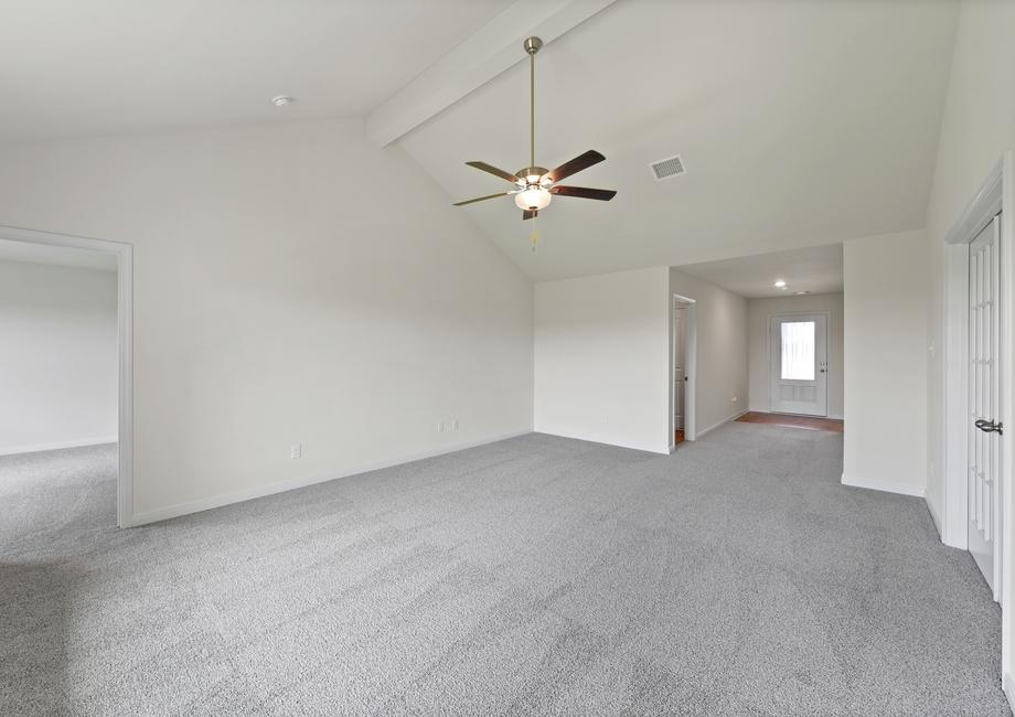 The spacious family room is perfect for family living and hosting.