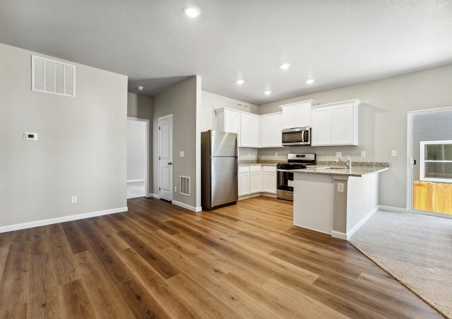 The dining room is connected to the chef ready kitchen.