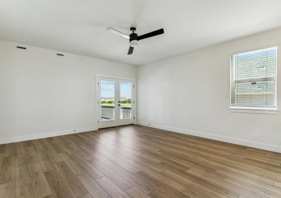 The family room has doors to the back yard that let in great, natural light.