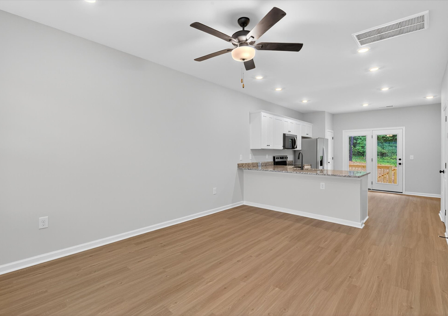 The living room connects to the kitchen. 