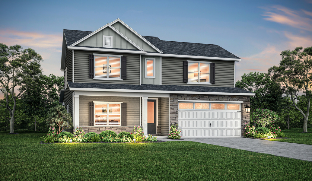 Graham floor plan with siding and stone around the garage at dusk.