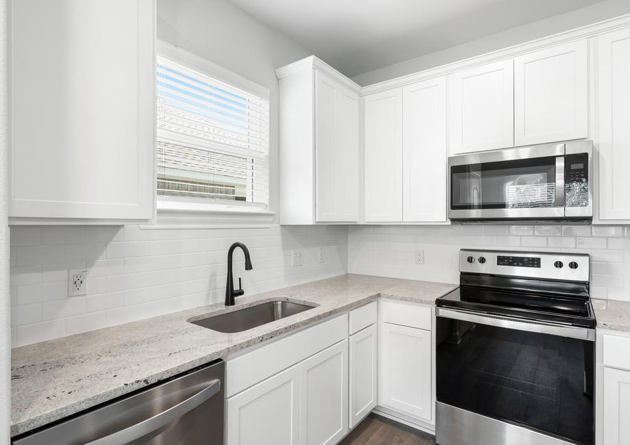 The kitchen of the Blanco has sprawling granite countertops.