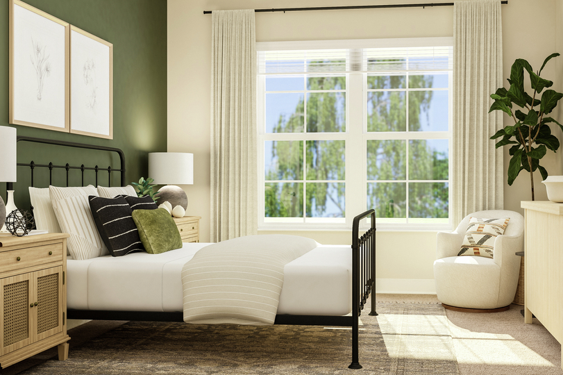 Rendering of fourth bedroom showing black
  framed bed with nightstand along green accent wall on left, large window
  center, and a wood dresser right with beige carpet flooring throughout.