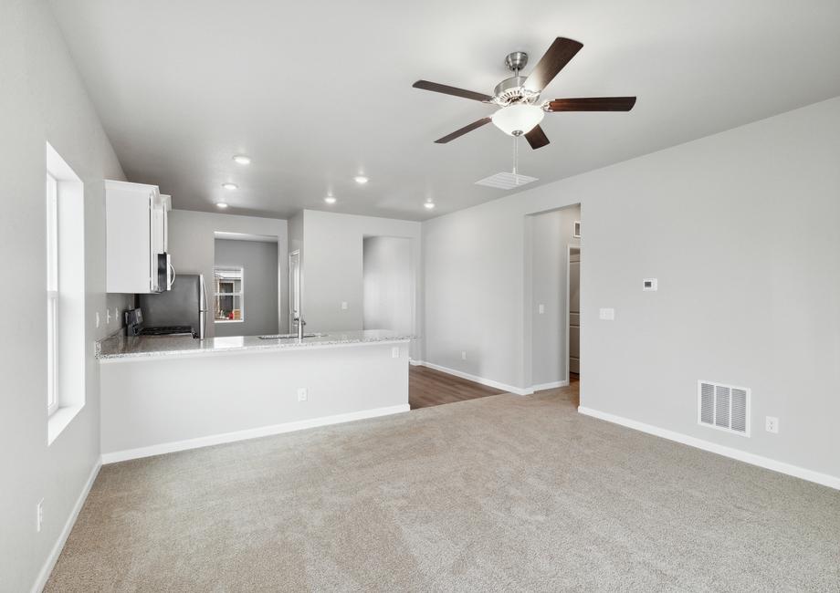 Open layout with the kitchen overlooking the large living room.