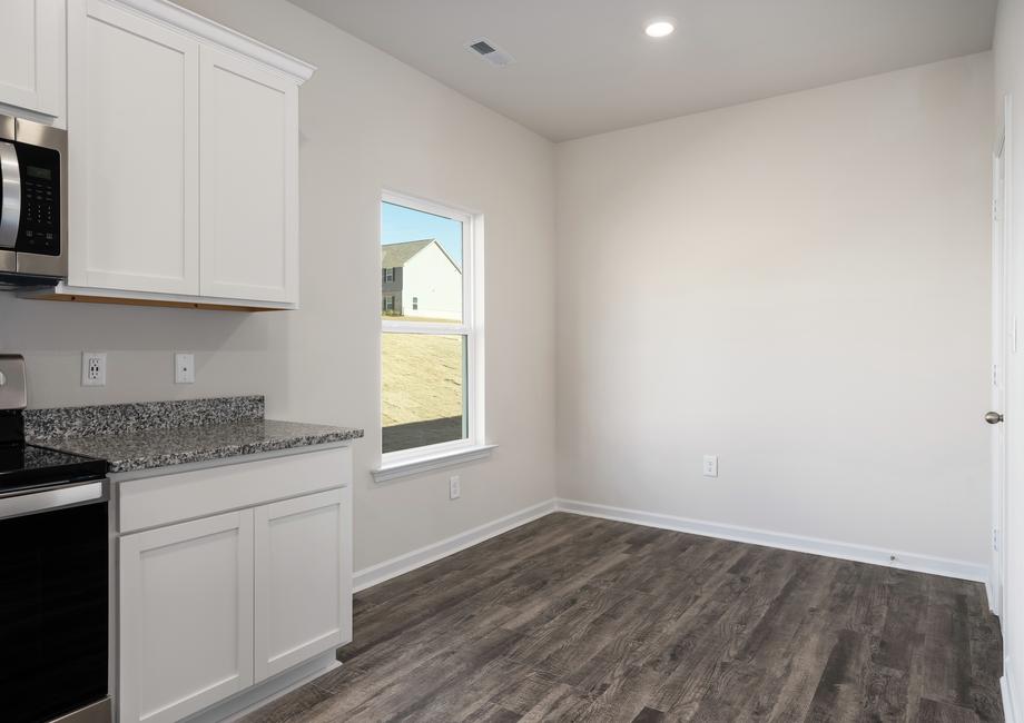 The cozy breakfast nook is perfect for sharing a cup of coffee with your family