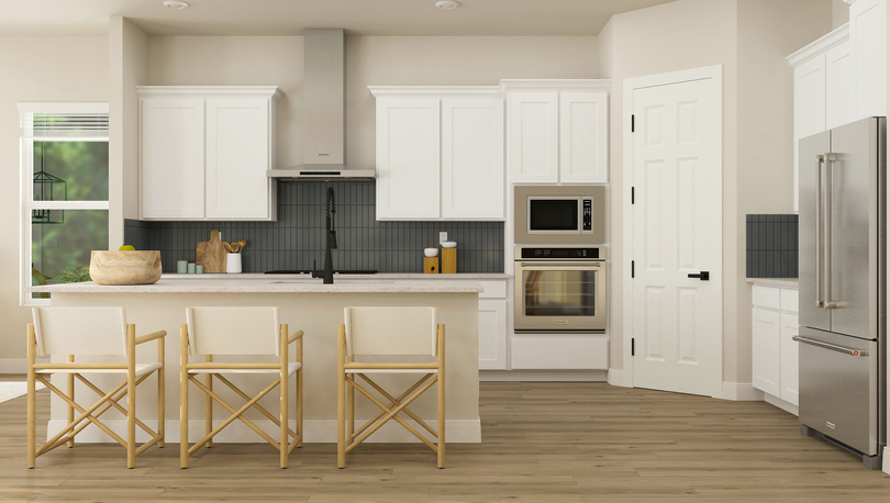 Rendering of the incredible kitchen in
  the Laurel floor plan. The space has an island, tiled backsplash, white
  cabinetry and stainless steel appliances.