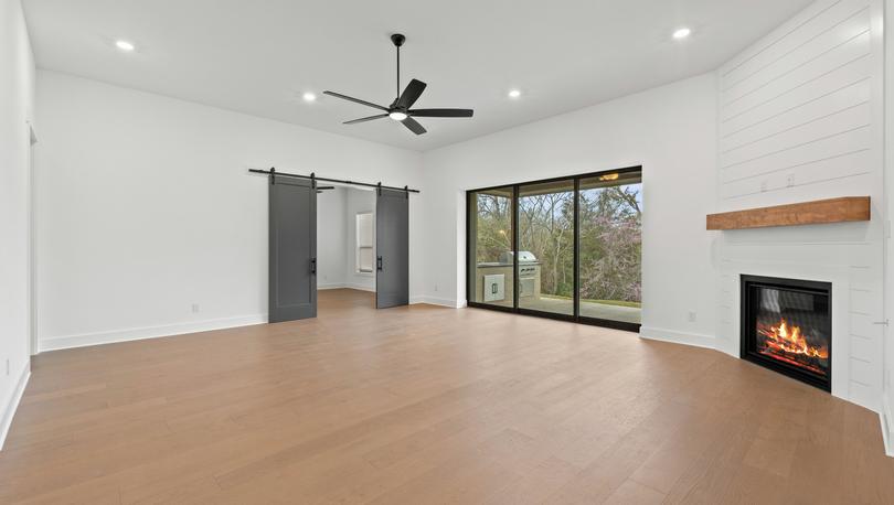 The open layout connects the kitchen with the breakfast area and family room.