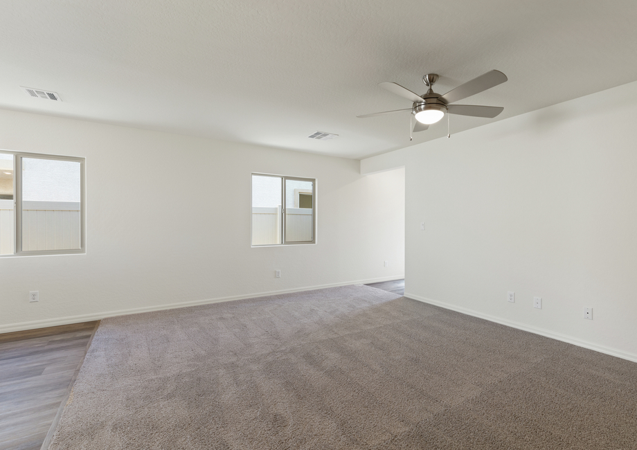 The family room of the Aspen has large windows that let in great natural light.