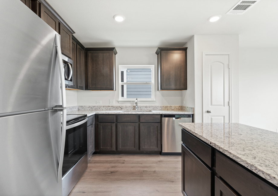 The kitchen of the Blanco has sprawling granite countertops.