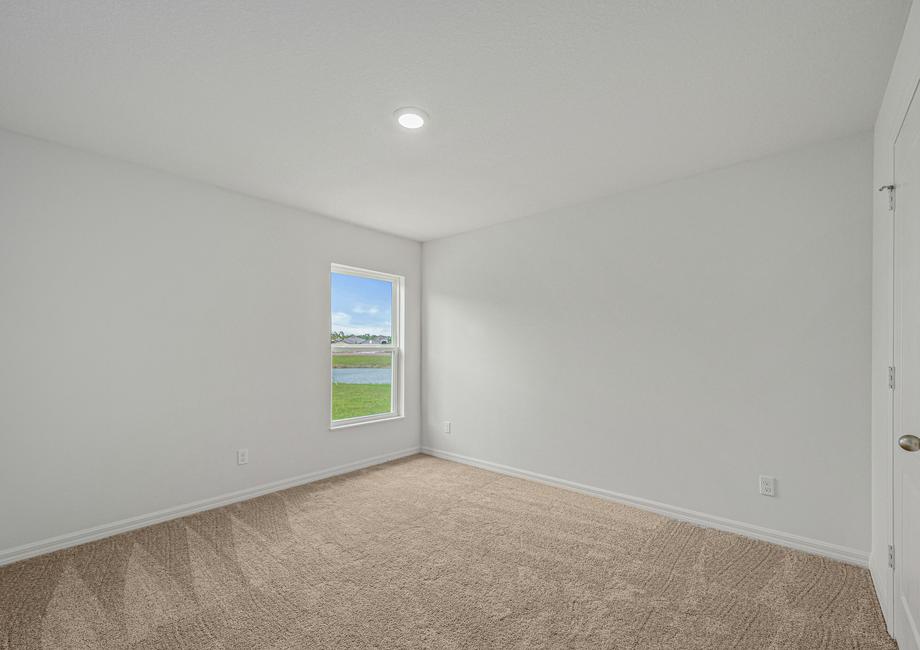 A secondary bedroom with its own closet