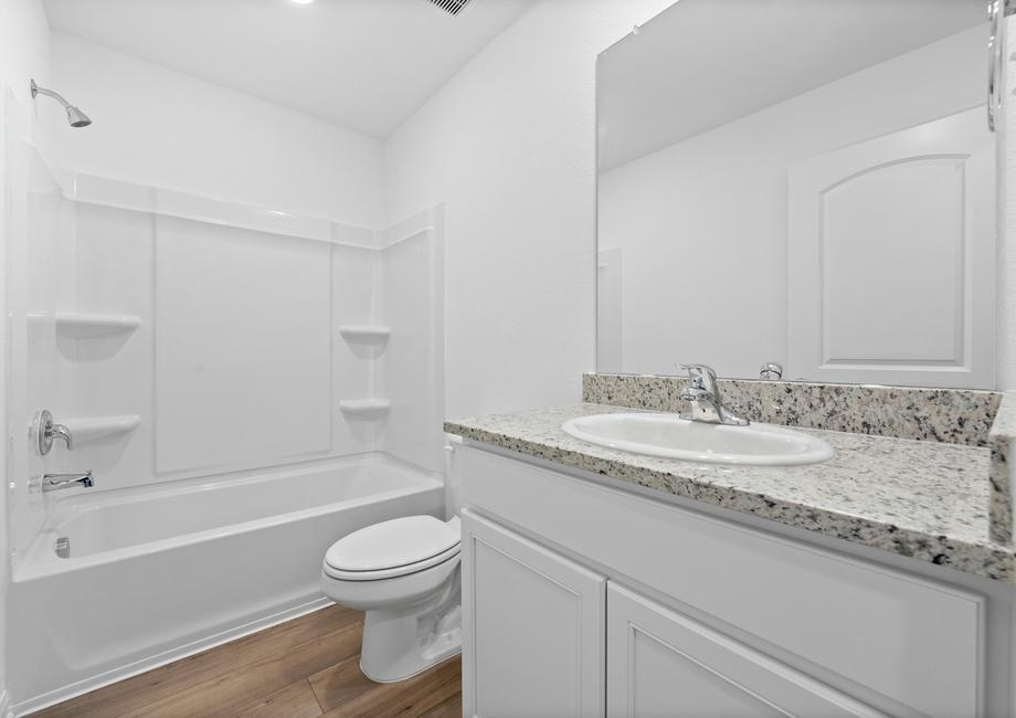 The secondary bathroom is perfect for guests