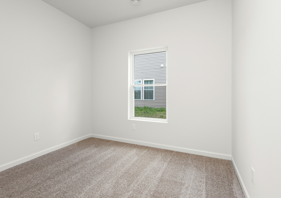 The secondary bedroom has carpet.