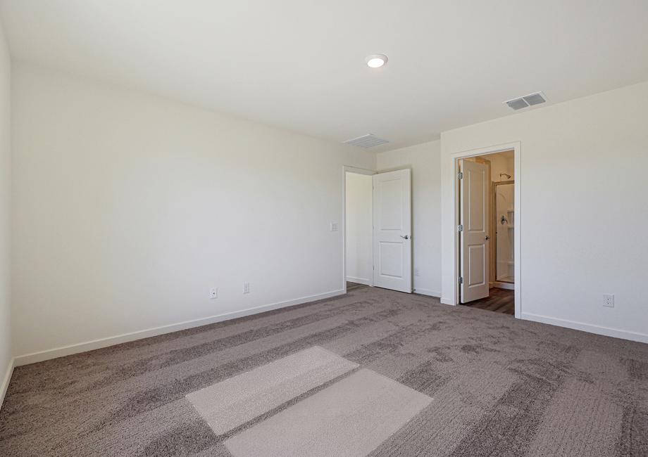 The master suite has a private master bath and large walk-in closet!