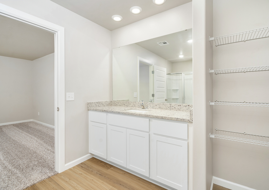 Bathrooms hold ample storage space for your belongings.