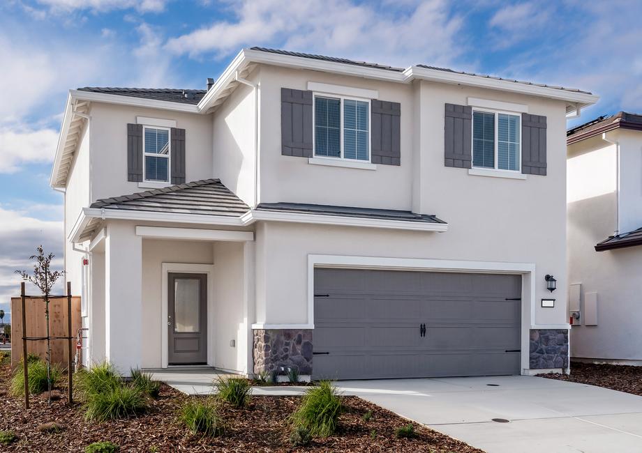 The Morgan is a beautiful two story home with stone and stucco