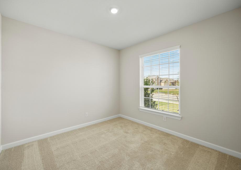Spacious, secondary bedrooms are found throughout.