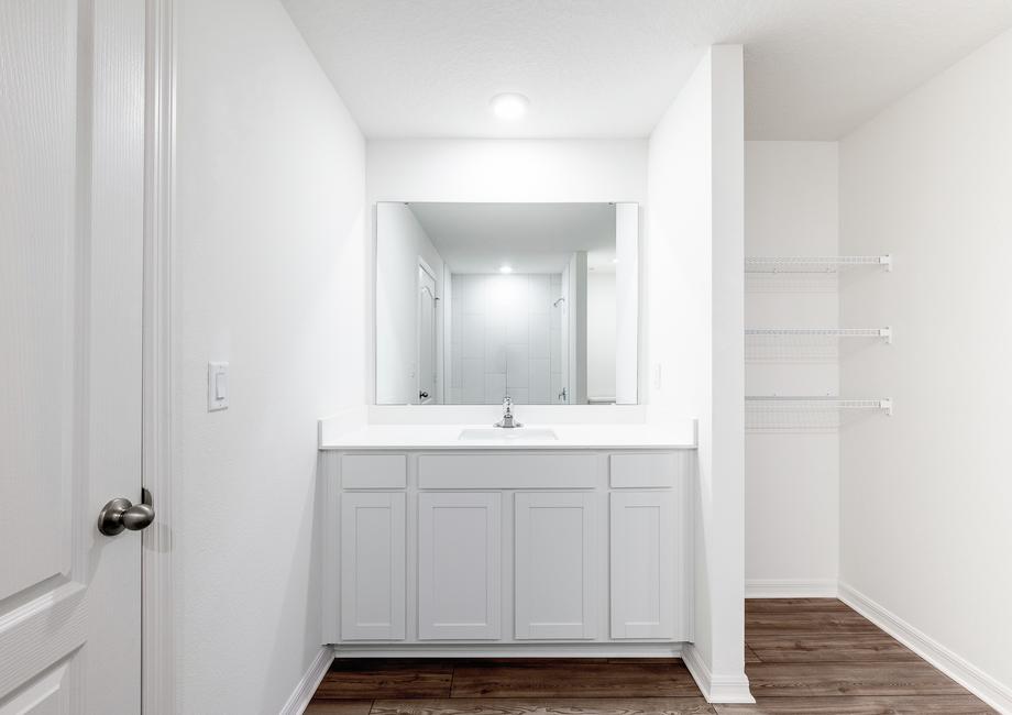The master bathroom comes with built in shelves for extra storage.